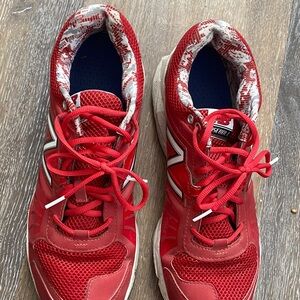 2 pairs of Slightly worn NB Baseball sneakers